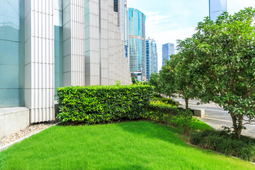 Obraz na płótnie Canvas Modern urban architecture and green plants in Shanghai