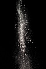 White powder on a black background