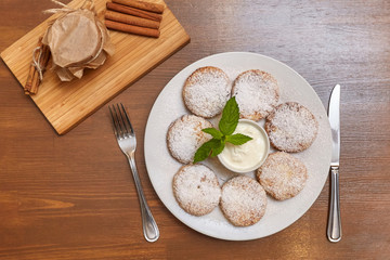 Cottage cheese pancakes or fritters. Traditional Russian and Ukrainian cuisine
