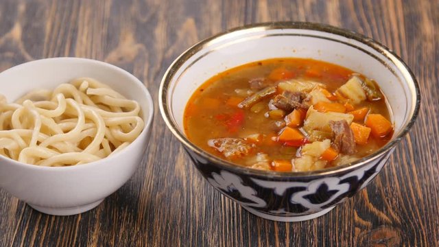 Uzbek lamian on a wooden table