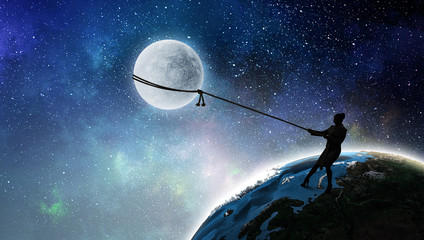 Woman catching moon . Mixed media