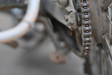 Fototapeta na wymiar rear chain and sprocket of motorcycle wheel