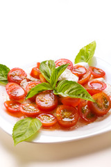 Caprese salad on white table