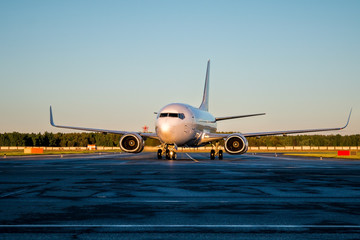 Passenger aircraft moves at the taxiway