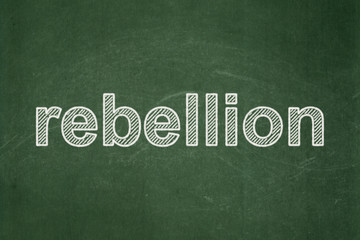 Obraz premium Political concept: Rebellion on chalkboard background