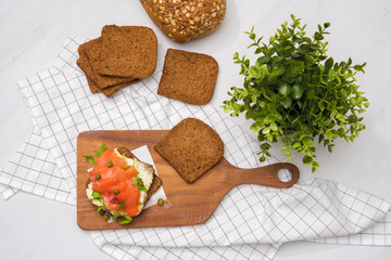 Salmon Sandwich on wooden plate