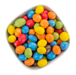 Portion of Cocolate coated Peanuts isolated on white