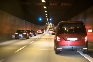 The traffic is queing in the Elbtunnel of the city of Hamburg