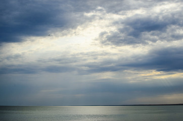 Fototapeta na wymiar Seascape cloudy sky