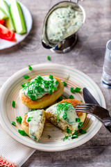 Zrazy with greens on a plate. Served table