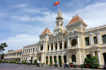 Ho Chi Minh City, Viet Nam - July 11, 2017: The Ho Chi Minh City Hall, or Ho Chi Minh City People's Committee in sunny day, built in 1902-1908 in a French colonial style for the then city of Saigon