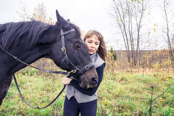 Obraz premium Girl and horse