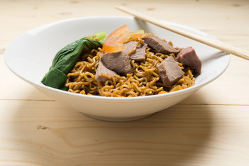 Local cuisine Kolo Mee or Mee Kolok in Sarawak, Malaysia.