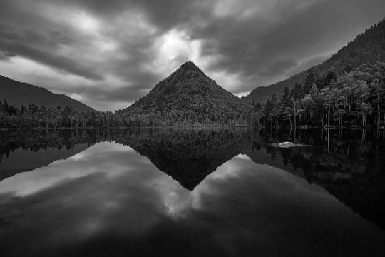 Mountain Cap of Monomakh reflected in the lake