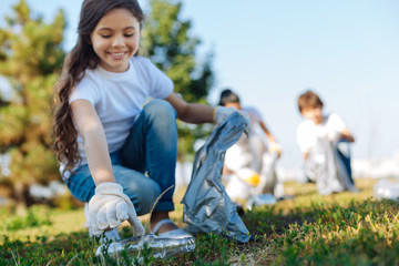 Cheerful girl working hard in team