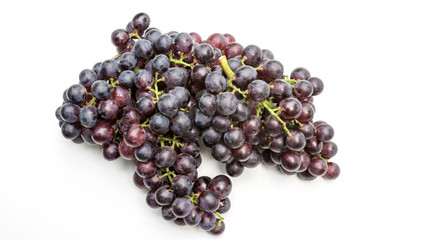 Bunches of ripe grapes on a white background.