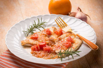 escalope with shallot and grapefruit, selective focus