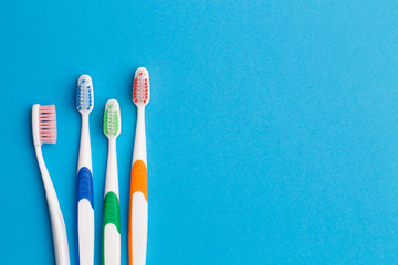 Multi-colored toothbrushes, space for text