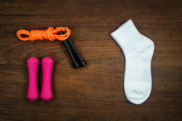 Sports equipment on wooden table for sports activities., Sport accessories.