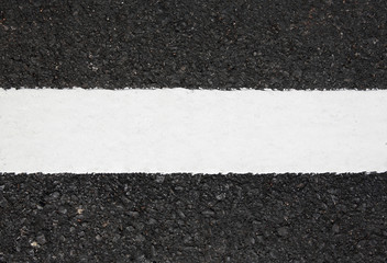 Fototapeta premium Asphalt road texture with white stripe.