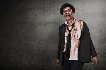 Portrait of asian zombies man with wounded face