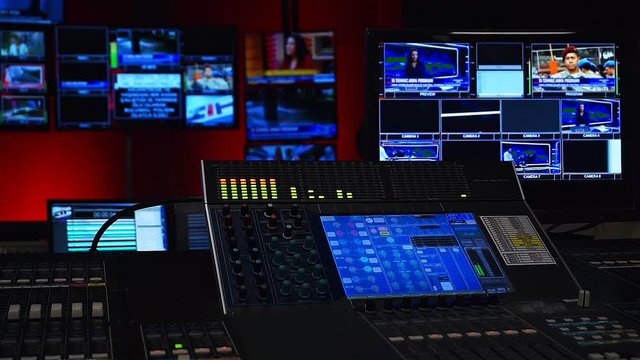 Tv Control Room with  a lot of Screens