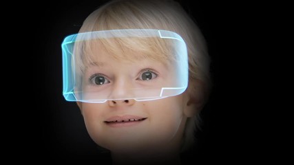 Virtual reality headset, innovation technology of future entertainment. Small child using holographic VR goggles for playing futuristic game. Happy about victory.