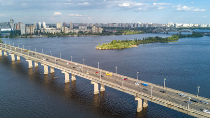 Naklejka na ściany i meble Aerial top view of Paton bridge and Dnieper river from above, city of Kiev, Ukraine 