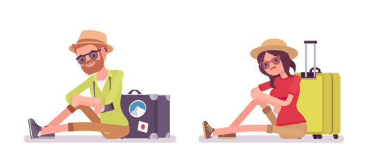 Tourist man and woman sitting on the floor