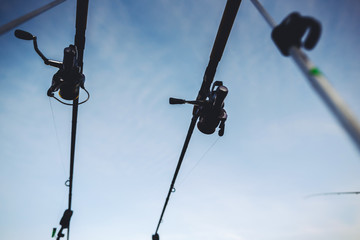 Abstract view of fishing, lake in background, summer sunset