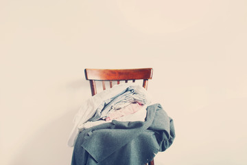 Vintage Chair Pile Clothes White Wall Toned