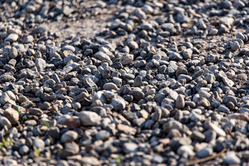 Crushed stone on the road as a background