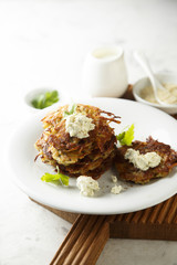 Potato latkes with cream cheese and herbs