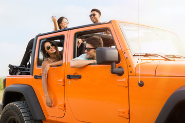 Group of happy young people laughing and having fun