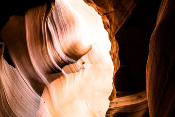 beautiful slot canyon in northern Arizona with hues of yellow, orange and red