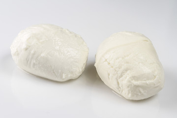 Fototapeta na wymiar Ingridients for Caprese salad. Mozzarella cheese. Isolated on white background