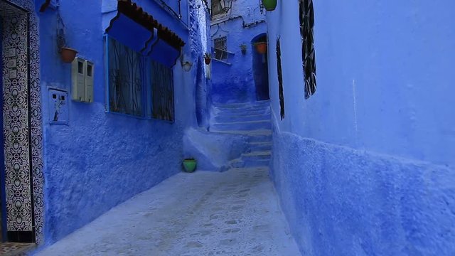 POV, walking in blue town Chefchaouen Chaouen / Morocco, first point of view