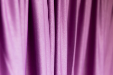 Purple cloth on the curtain as a background