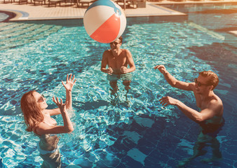 Young friends in swimming pool