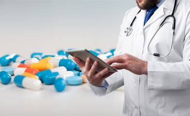Pill and doctor.