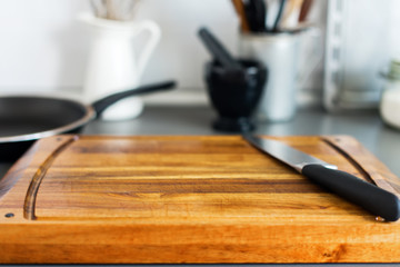 Chopping Board and Knife on Grey Table-top Kitchen