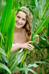 Fototapeta premium A beautiful lady on the nature. Pleasure.