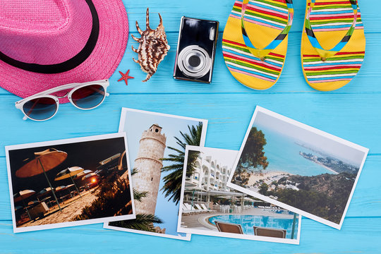 Women beach accessories above photos. Stuff for sea, photos of resorts, blue background. Choose the place of vacation.
