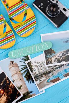 Concept of summer vacation. Flip-flop, camera, message, different pictures.