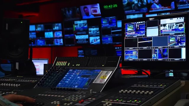 Tv Control Room with  a lot of Screens