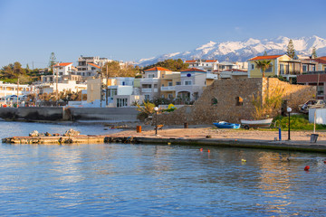 Fototapeta na wymiar Coastline of Kato Galatas town with Samaria mountains on Crete, Greece