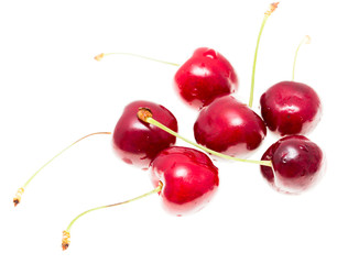 Obraz na płótnie Canvas Juicy red cherry on a white background
