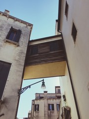 Fototapeta na wymiar A funny bridge between two buildings (Venice, Italy)
