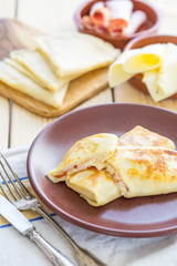 Food, Russian Pancakes Stuffed by Sliced Ham and Cheese, Vertical View