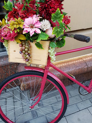 Fototapeta na wymiar Photo of bicycle with flowers